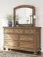 Feddinger Queen Storage Sleigh Bed with Mirrored Dresser and Nightstand